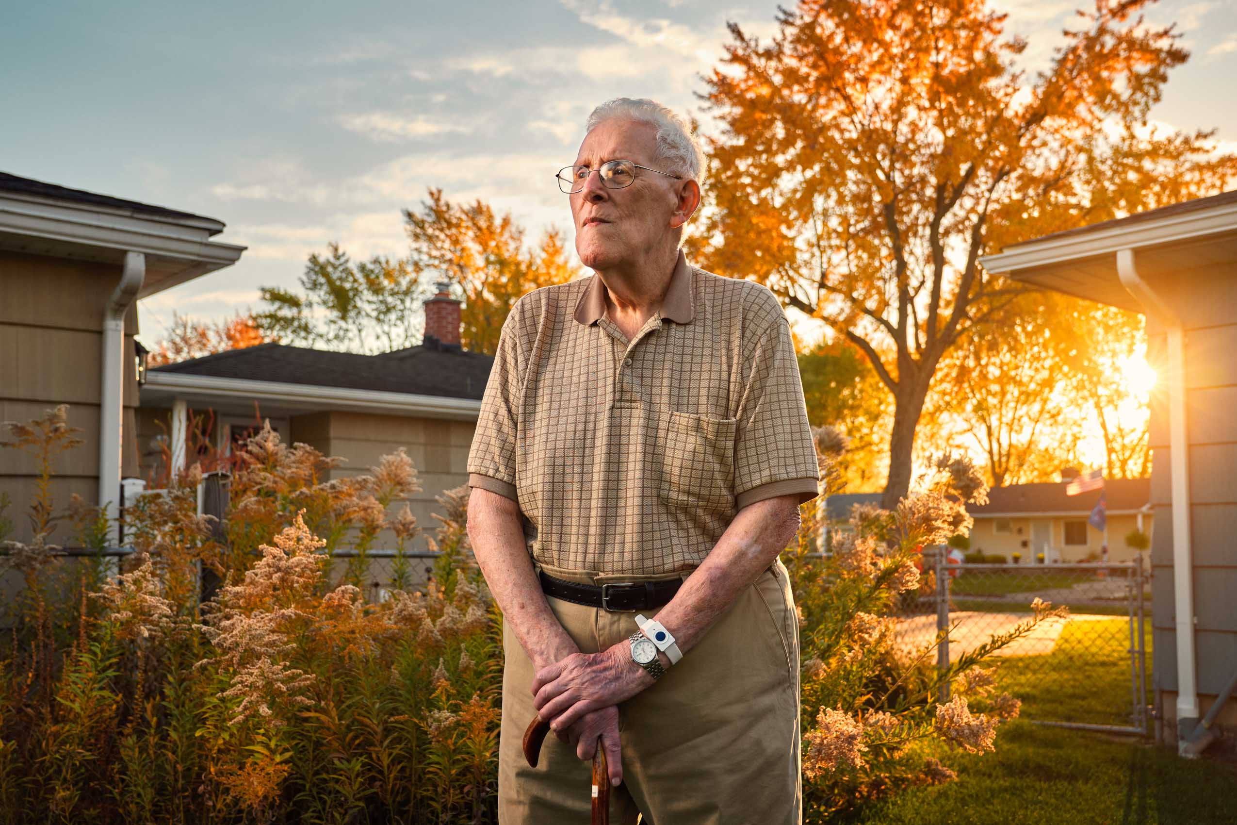 Jim Maier poses in his backyard during an autumn sunset in BUffalo Ny